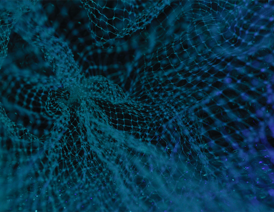 Imagen de muchos nodos en una red informática de colores azul y verde.